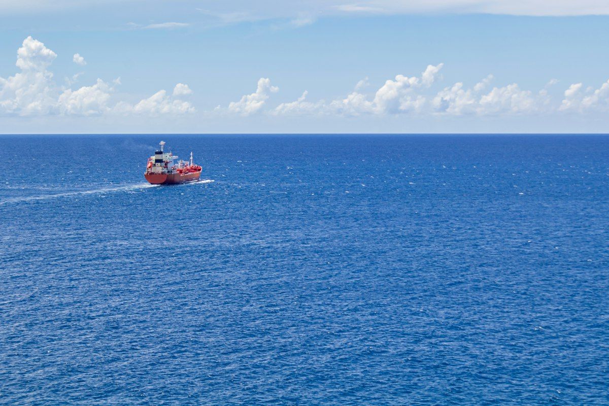 A tanker under way on open blue sea